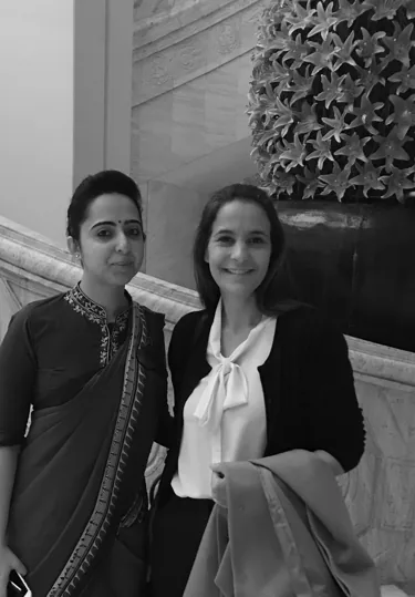 Carolina with a colleague at a work event